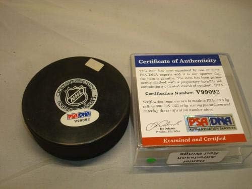 Даниел Альфредссон подписа автограф хокей на шайби на Детройт Ред Уингс PSA/DNA COA 1Б - за Миене на НХЛ с автограф