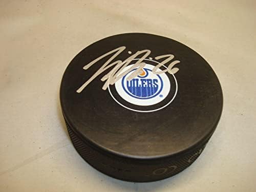 Лиро Пакаринен подписа хокей шайба Едмънтън Ойлърс с автограф 1А - за Миене на НХЛ с автограф